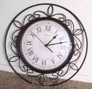 lot 127 image: Decorative wall clock battery powered, in working condition