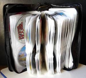 lot 26 image: AMAZING DVD COLLECTION OF 121 CHILDRENS MOVIES IN STORAGE BINDER