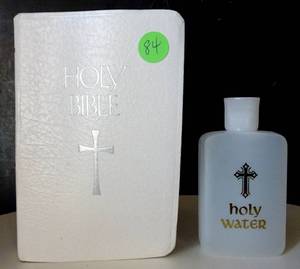 lot 84 image: HOLY BIBLE AND HOLY WATER