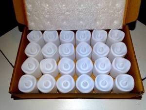 lot 201 image: NEW- JULIE ANN HOME LED VOTIVE CANDLES - BOX OF 24