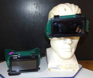 lot 238 image: PAIR OF WELDERS GOGGLES AS SHOWN (Model head not included)