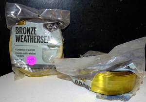lot 239 image: LOT OF 2 0 BRONZE METAL WEATHERSEAL - 1 SEALED1 OPEN PKG