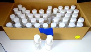 lot 245 image: LOT OF 43 UNEBRANDED TRAVEL SIZE SANITZER BOTTLES