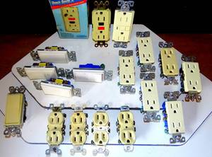 lot 264 image: LOT OF ASSORTED WALL SWITCHES AND OUTLETS INCLUDING 3 GFI SWITCHES