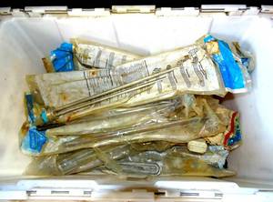 lot 275 image: LARGE TOTE FULL OF HOT WATER HEATER ELEMENTS (TOTE INCLUDED)