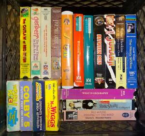 lot 356 image: BASKET FULL MOF VHS TAPES AS SHOWN