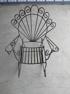 lot 7 image: Childs Wrought Iron Rocking Chair 29x26x23