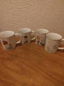 lot 49 image: Lot of 4 Enesco Precious Moments Cups-1985
