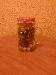 lot 51 image: Golden Harvest Drinking Jar Full of Vintage Marbles