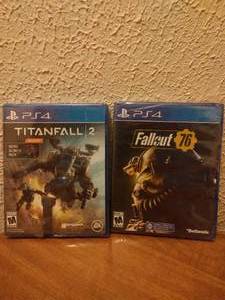 lot 53 image: Lot of 2 Playstation 4 Video Games-Titanfall 2 and Fallout 76-NIP-Protective Plastic Covering Beginning to Come Off