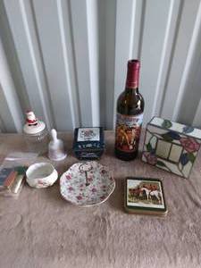 lot 76 image: Misc. Lot of Items-Freakshow Wine Bottle(empty), Precious Moments Bell, Stained Glass Napkin Holder, Lefton Dish and More