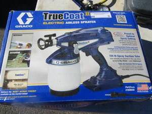 lot 9 image: True coat electric airless sprayer used in original box, Air pressure hose and gauge also