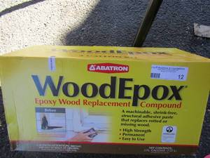 lot 12 image: Box of used wood expo epoxy replacemnet compound, 2 gallon kit