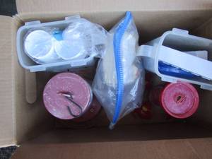 lot 14 image: Box of used bird feeders, sugars and dyes,