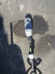 lot 19 image: E-Go-Pro 56V  electric weed eater with battery and charger, also comes with pre cut string 3 rolls, great condition works
