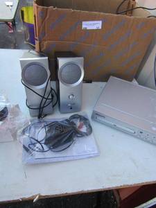 lot 31 image: Phillips DVD player all wires includes, also includes A New HD speaker player, set of Bose speakers with wires like new