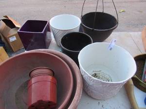 lot 66 image: various size planter pots some glass some plastic