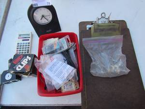 lot 78 image: small clock for bedside, plastic paper clips, misc. items in box