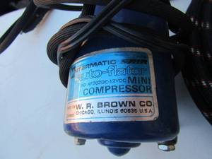 lot 79 image: intermatic mini compressor with hoses unknown working condition