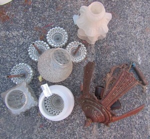 lot 82 image: vintage chandalier , misc. light fixture covers, and a clear glass vase