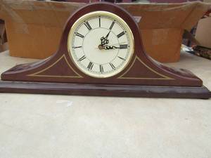 lot 122 image: The Bombay Company mantle clock in good condition made in taiwan