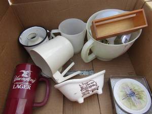 lot 123 image: kitchen lot includes measuring cups a hand strainer, cups, butterfly coasters, glass bathtub