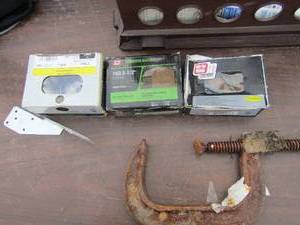 lot 138 image: tool lot includes pro fit nails,common nails, 2-12 inch nails a large c clamp, and various USP connectors