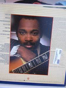 lot 169 image: White crate full of records includes, Pats greatest hits, George Benson, Chuck Berrys greatest hits, Ritchie Black-Moores and many more qty well over 20