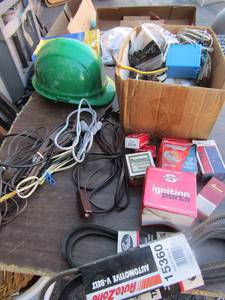 lot 195 image: extension cords, autozone car belts part# 15360 qty 3, Ignition parts rotor# CH-303 qty 4, misc. wall plugs and more