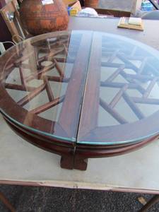 lot 193 image: Small solid wood brown table with 2 piece glass top very nice, was used for home dcor stand size is�.. 6 12 tall 29 12 diameter