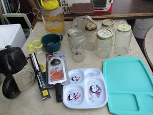 lot 209 image: kitchen lot of mason jars, kids plates, new sofy works slicer, sharp as a razor knife and more