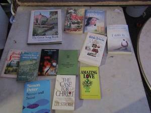 lot 214 image: Book lot includes, the voice of the martyrs, amazing love, the case for christ, simon peter and many more
