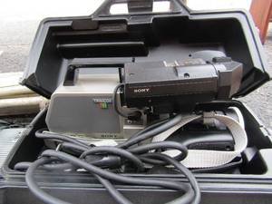 lot 232 image: Sony Trinicon 2400 video camera HVC in great condition cords included, panasonic portable cassette recorder model no. RQ-2102 brand new cord included also has paperwork