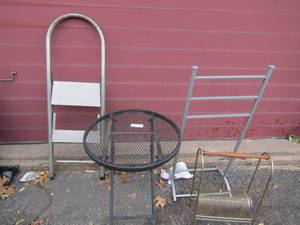lot 265 image: foldable out door metal table, 2 step step ladder, metal magazine rack, small laundry rail