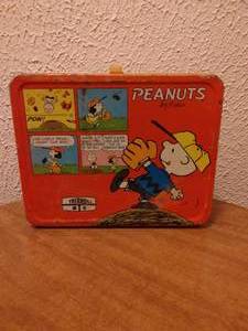 lot 23 image: 1960s Peanuts Metal Lunchbox--Missing Handle and Thermos