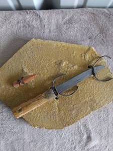 lot 73 image: Knife and Arrowhead on Granite