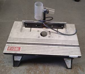lot 4 image: RYOBI RT101 ROUTER TABLE AS SHOWN.