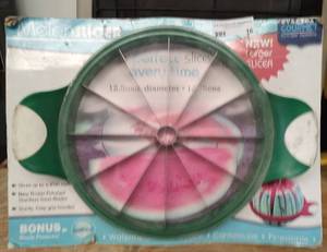 lot 16 image: WATERMELON SLICER IN PACKAGE AS SHOWN.
