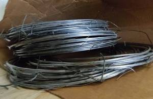 lot 33 image: FENCING RAZOR  SPIKES WIRE ROLLS AS SHOWN.