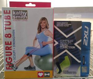 lot 81 image: KATHY SMITH FIGURE 8 TUBE PLUS 2XU COMPRESSION SOCKS AS SHOWN.