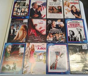 lot 118 image: LOT OF 12 DVDS AS SHOWN.