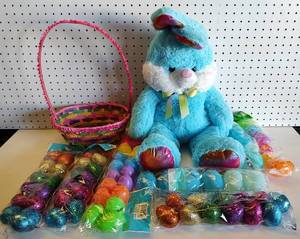 lot 232 image: LOT OF PLASTIC EASTER EGGS, EASTER BASKET, AND STUFFED EASTER BUNNY AS SHOWN.
