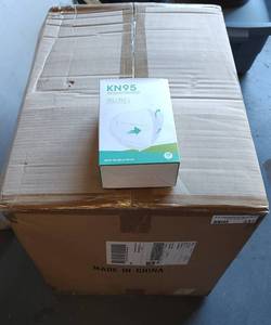 lot 237 image: CASE OF KN95 MASKS AS SHOWN. APPROX. 70 BOXES WITH 10 MASKS EACH.