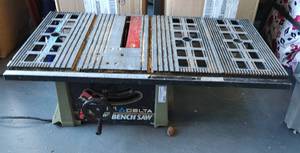 lot 239 image: DELTA BENCH SAW AS SHOWN.