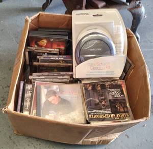 lot 303 image: LOT OF CDS AND CD CLEANER KIT AS SHOWN.