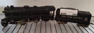 lot 329 image: VINTAGE METAL TRAIN CARS AS SHOWN.