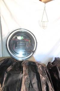 lot 165 image: (3) Light-up Plastic Trays, Brown table skirt, Hanging clear candle holders