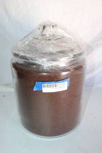 lot 168 image: Large glass lidded cannister full of coffee