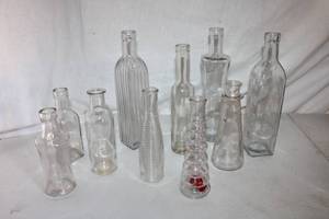 lot 173 image: 2 Boxes narrow clear vases and small bottles mixed variety