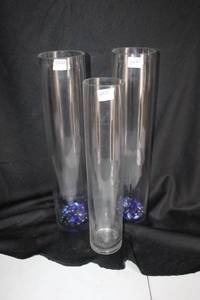 lot 249 image: (3) Clear round vases - 4x20 to 5x22 with blue glass beads